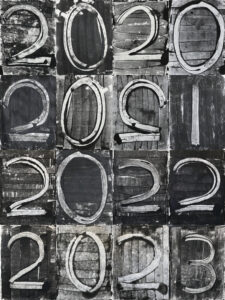Black and white artwork on paper with gestural scrape marks reading 2020, 2021, 2022, 2023.
