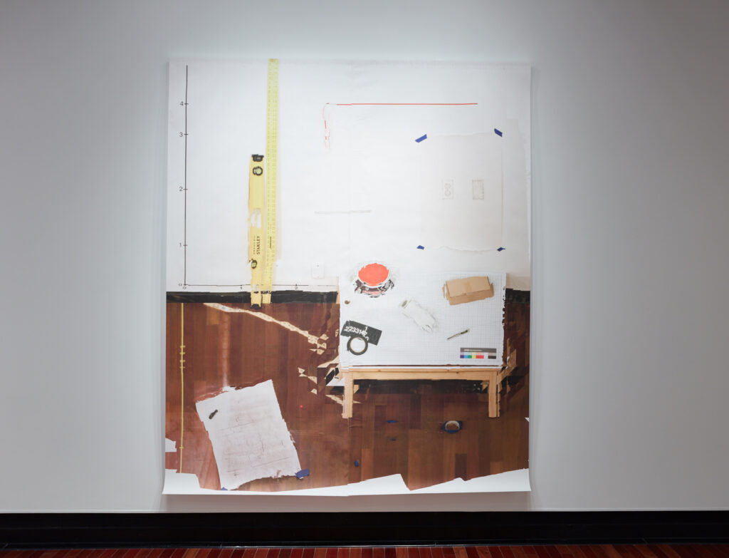 A large artwork depicting a gallery installation in progress, featuring a level, yardstick, and wall measurements amidst a scene of tools and preparatory sketches.