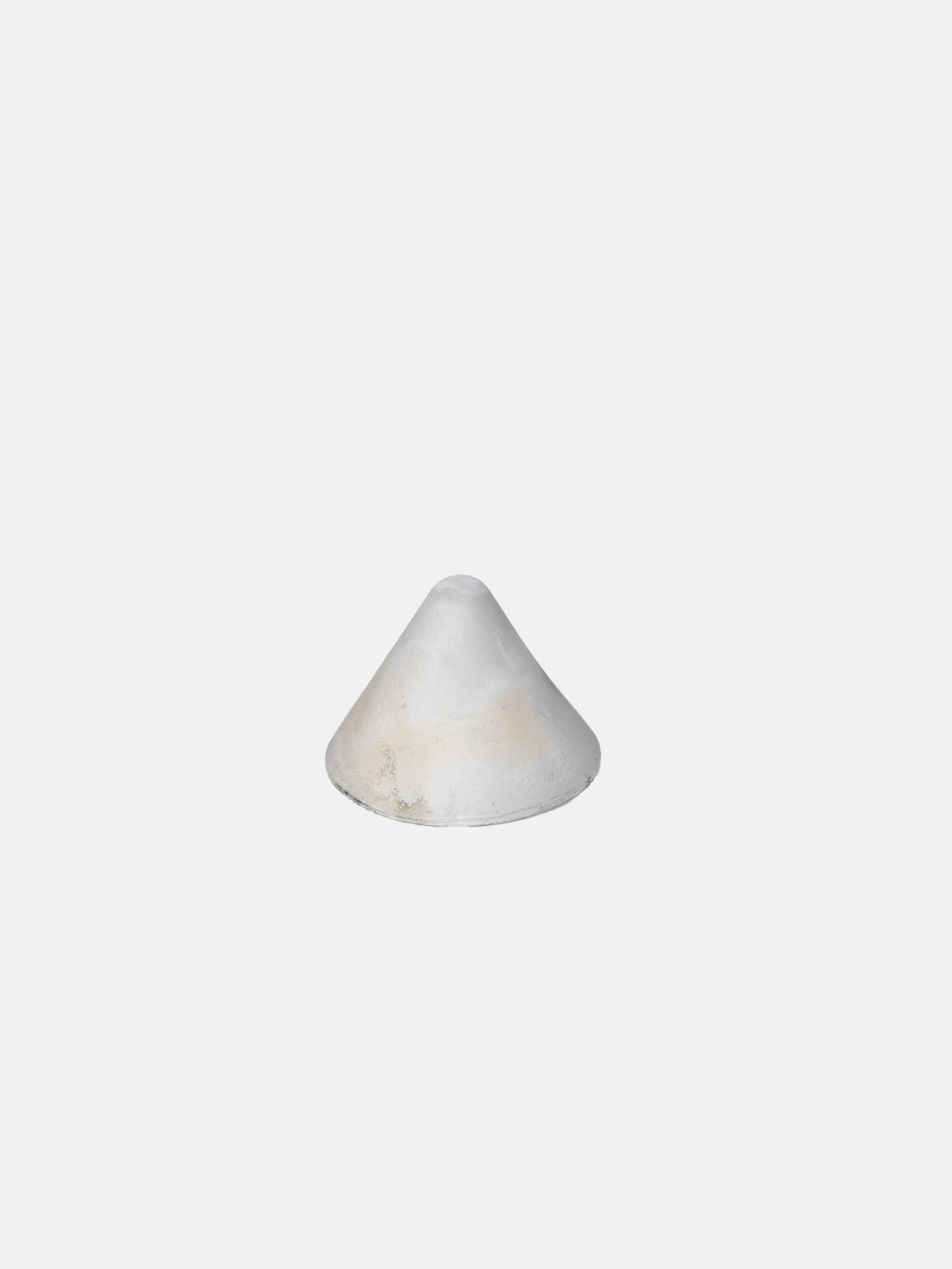 A light grey cone on an all-white background. The cone has some faint discoloration of black and brown.
