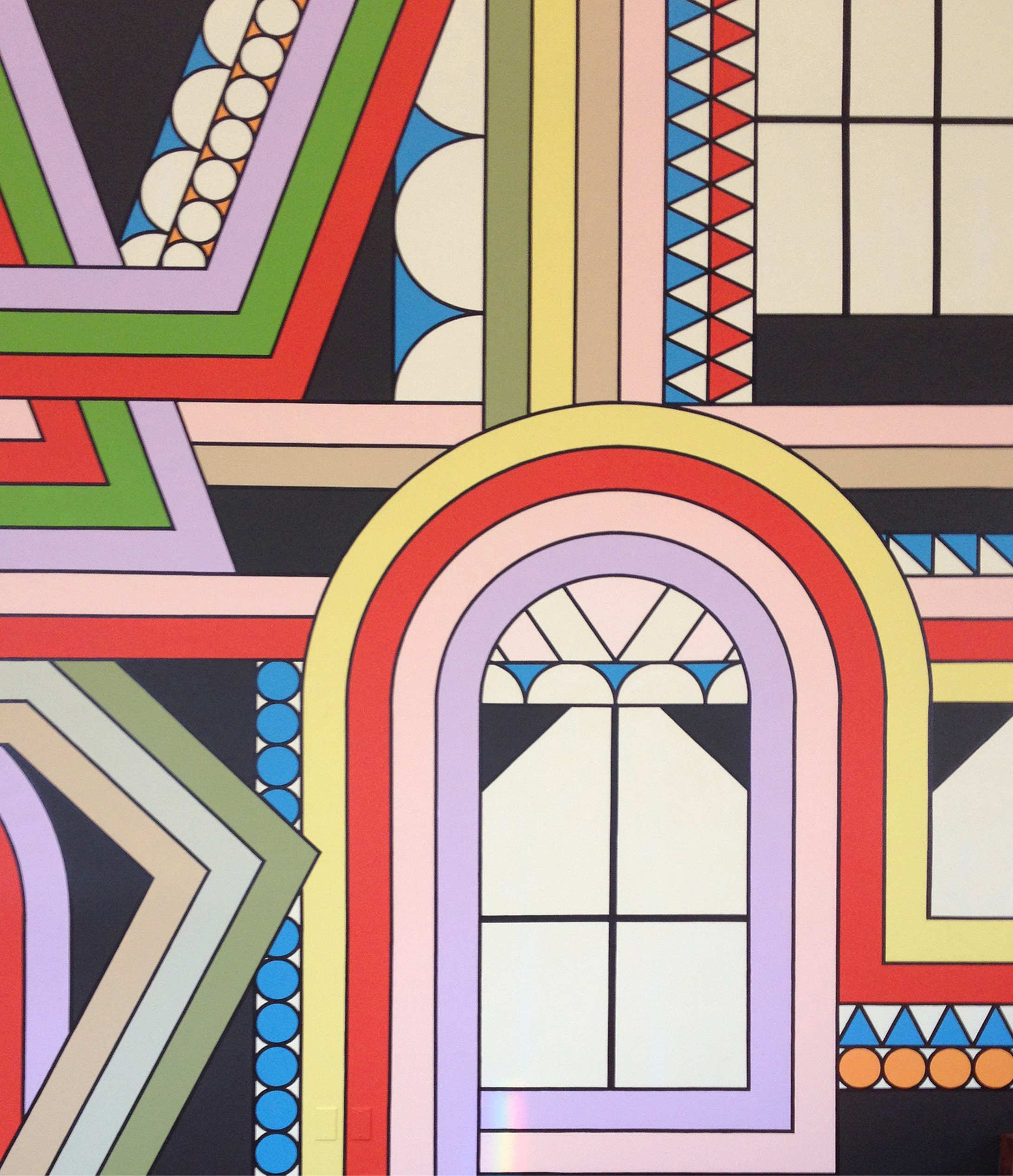 Detail of an abstract artwork showing black and white windows outlined by colorful arching stripes. More geometric stripes intersect in the background, some filled with triangles and circles.